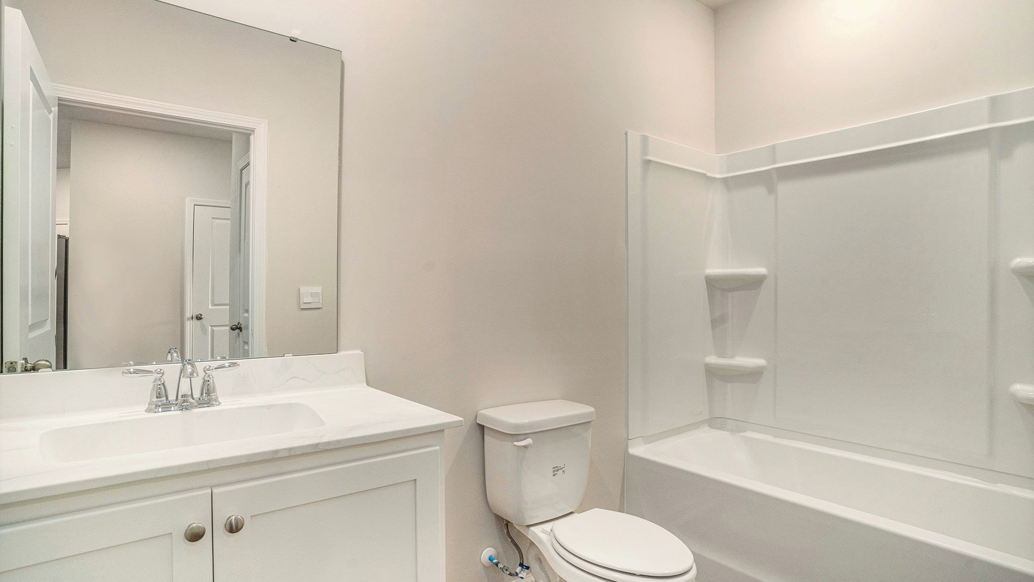 bathroom with quartz counters