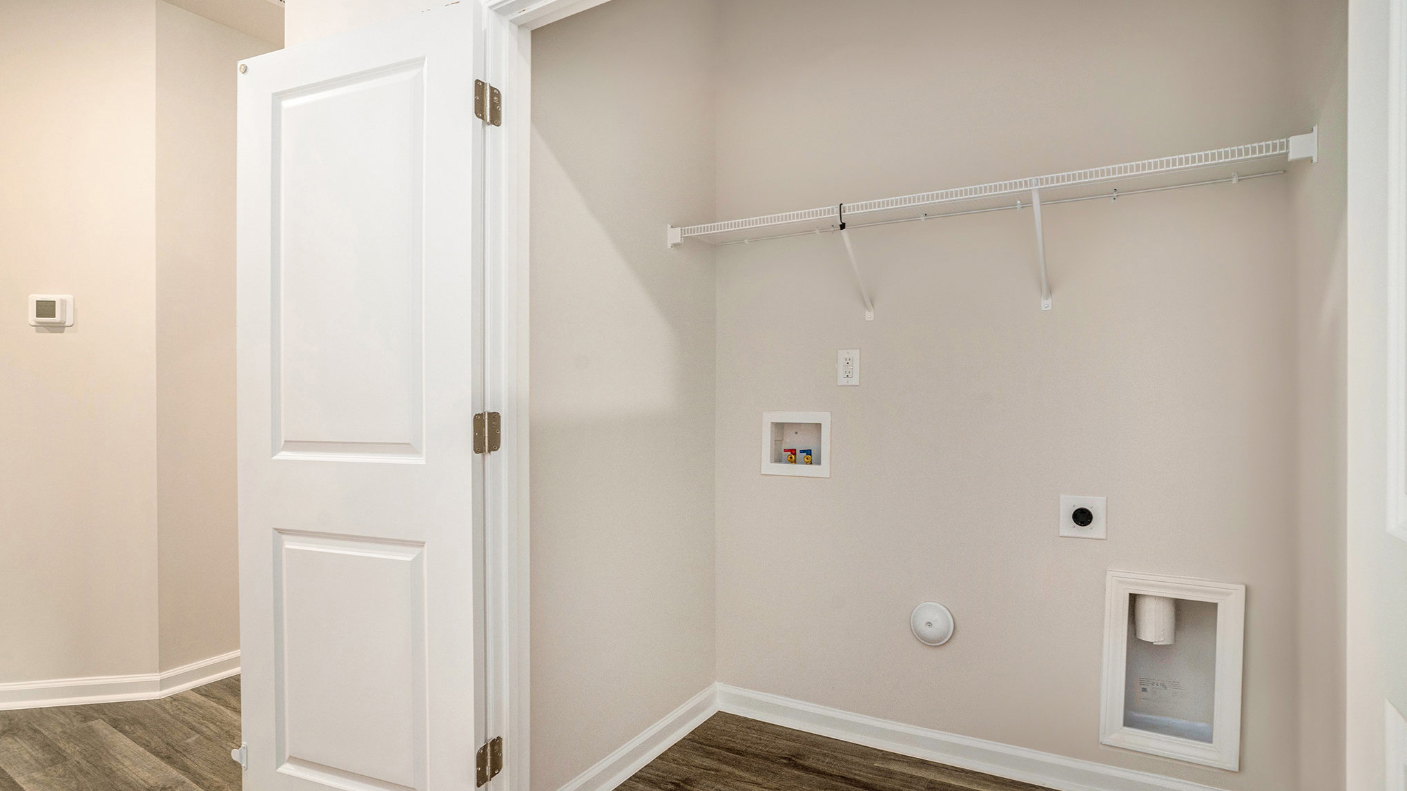 kaundry closet with wire shelving