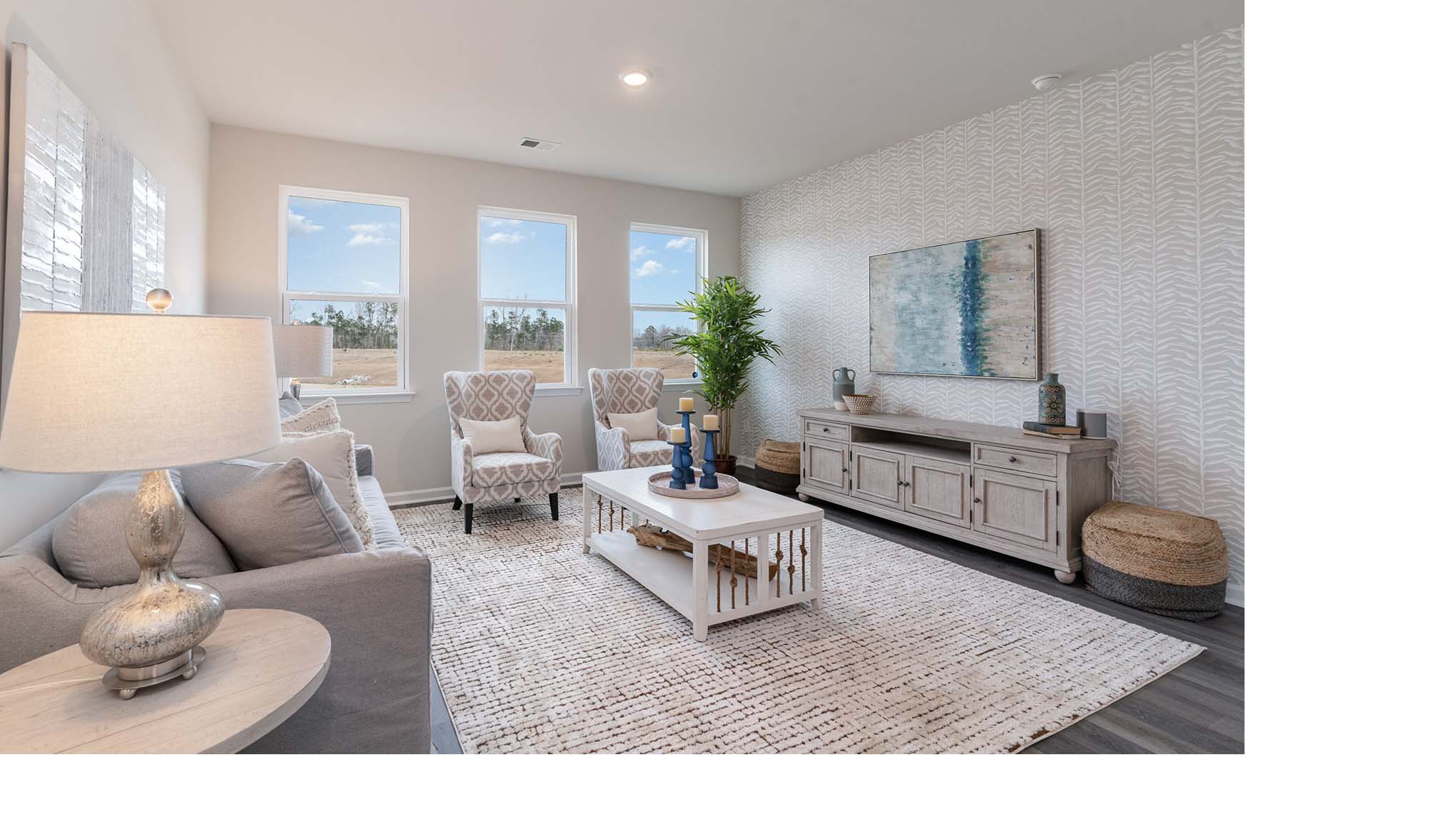 living room with ample lighting