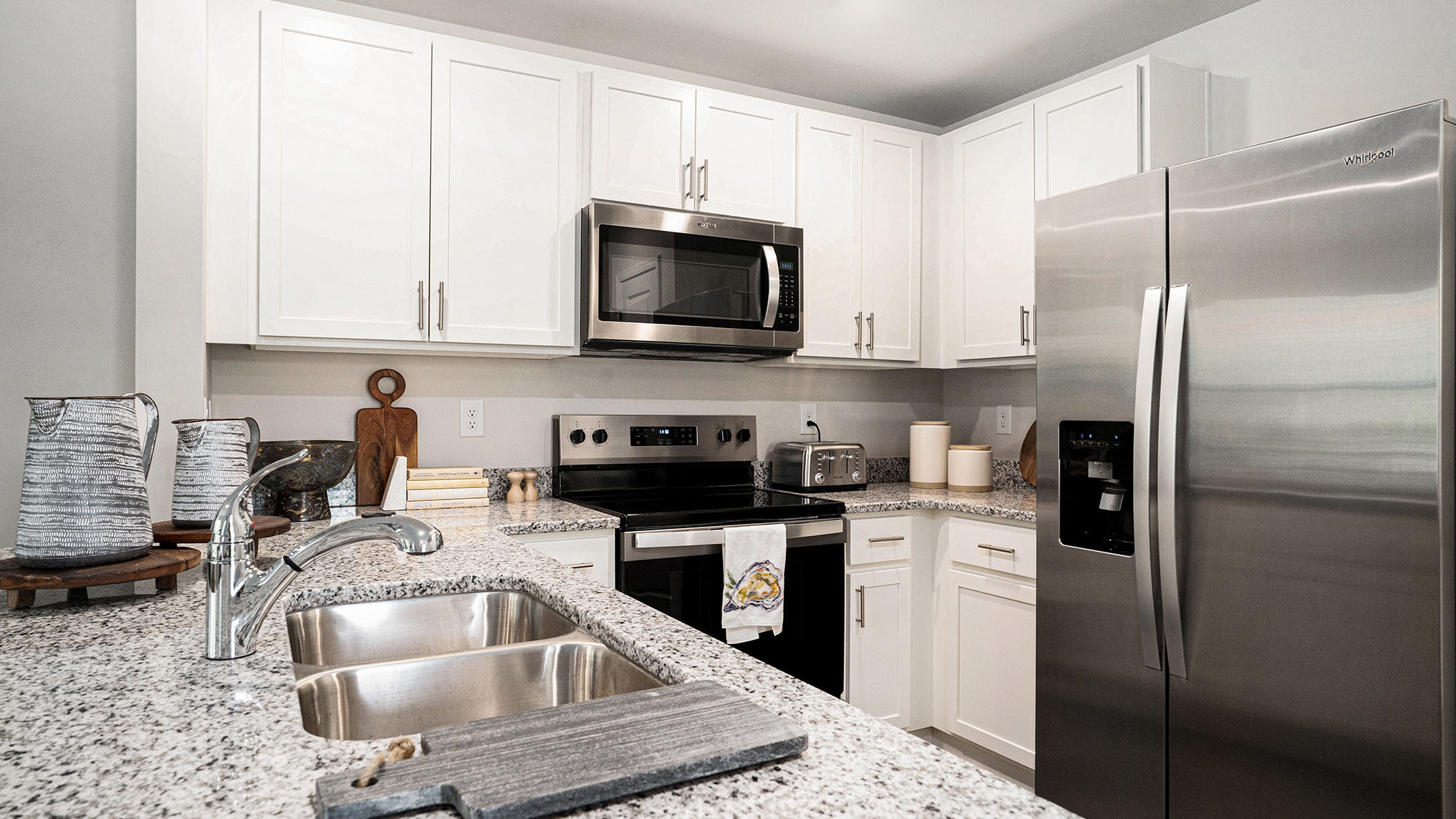 kitchen with white cabinets