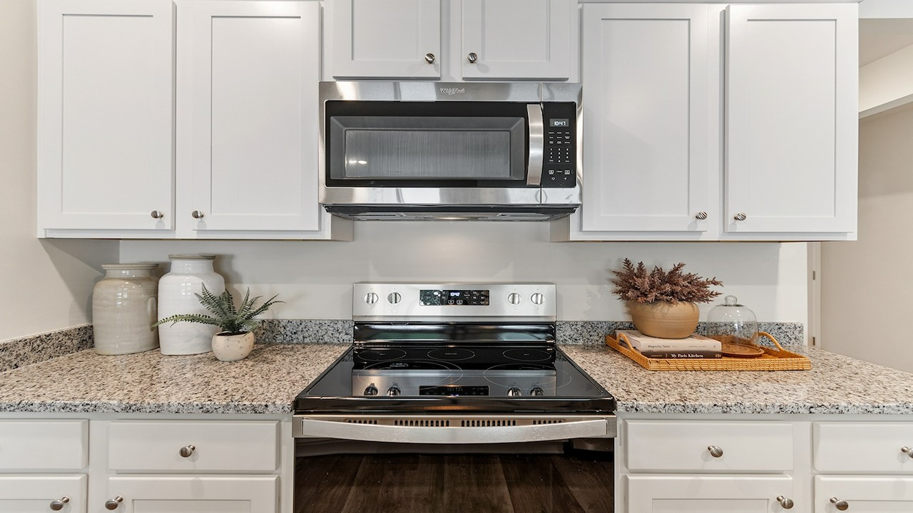kitchen with white cabinets
