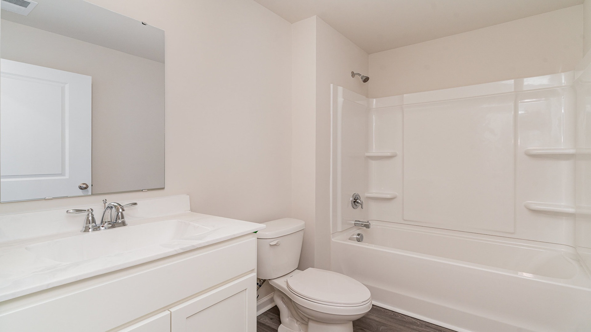 bathroom with quartz counters