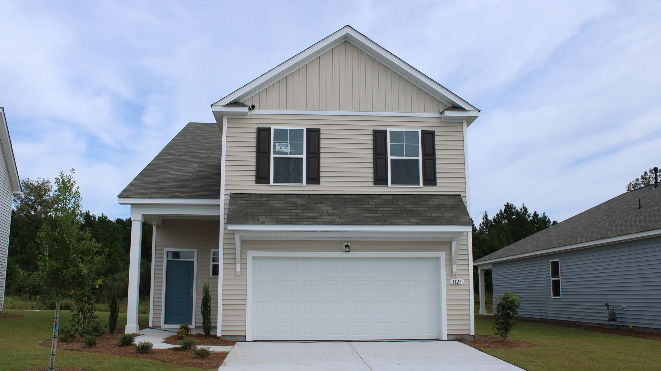 twos tory home with vinyl siding