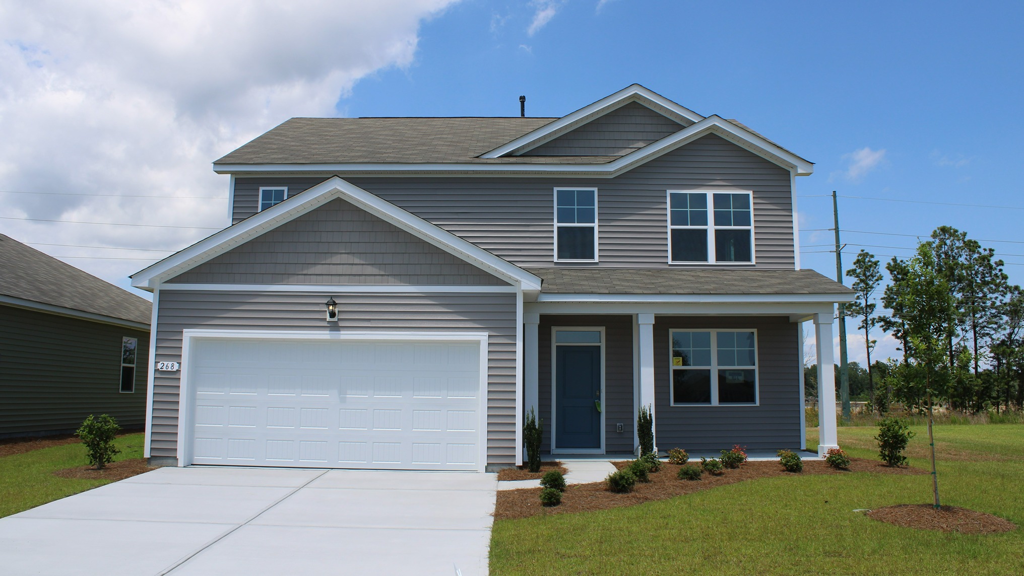 Two-story home with front porch