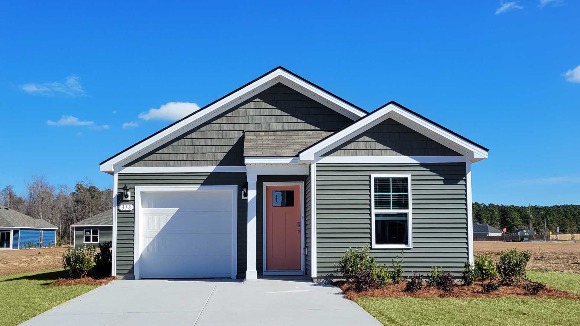 single story home with vinyl siding