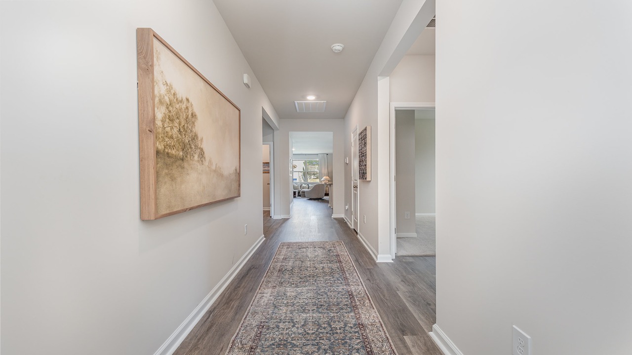 foyer with vinyl plank flooring