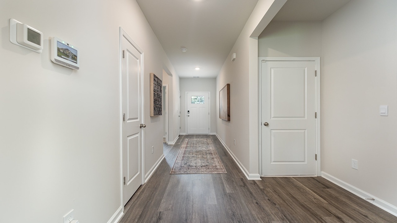 foyer with vinyl plank flooring