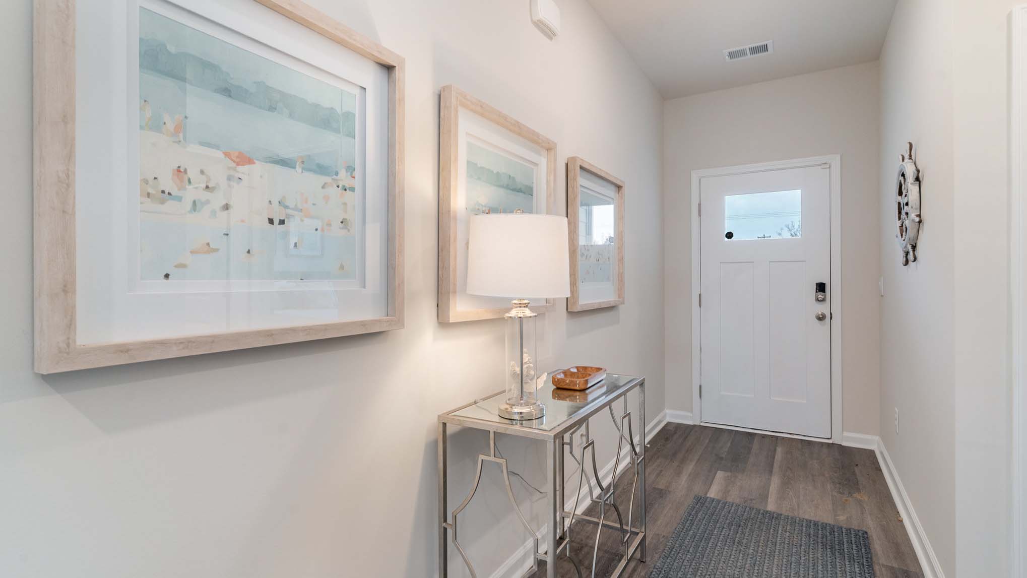 foyer with vinyl plank flooring