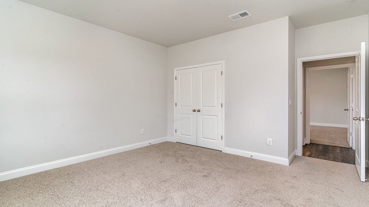 front bedroom with double window