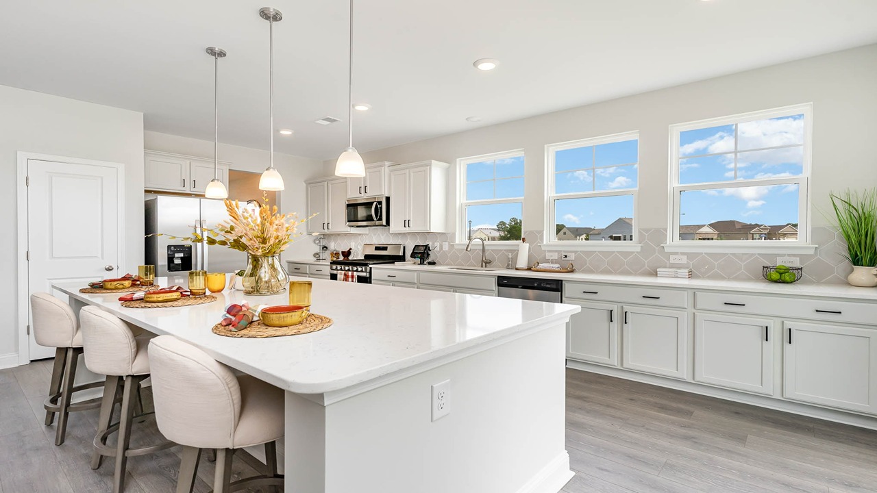 kitchen with gray cabinets and granite countertops