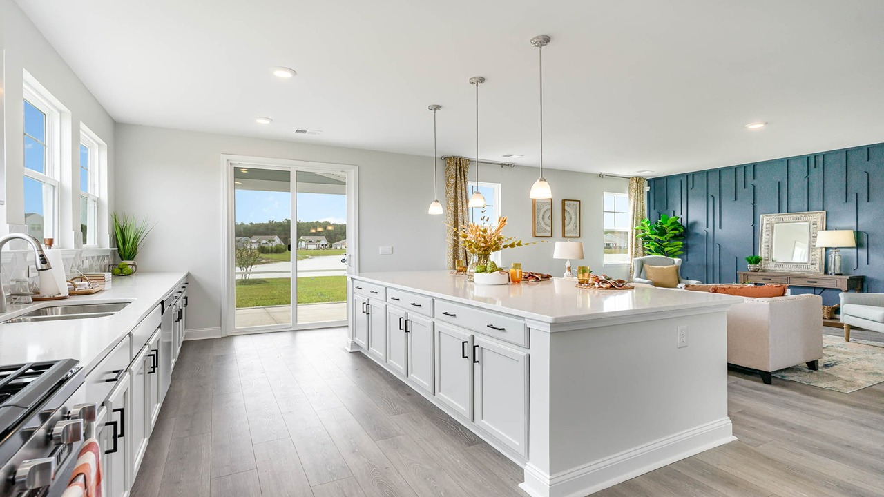 kitchen with gray cabinets and granite countertops