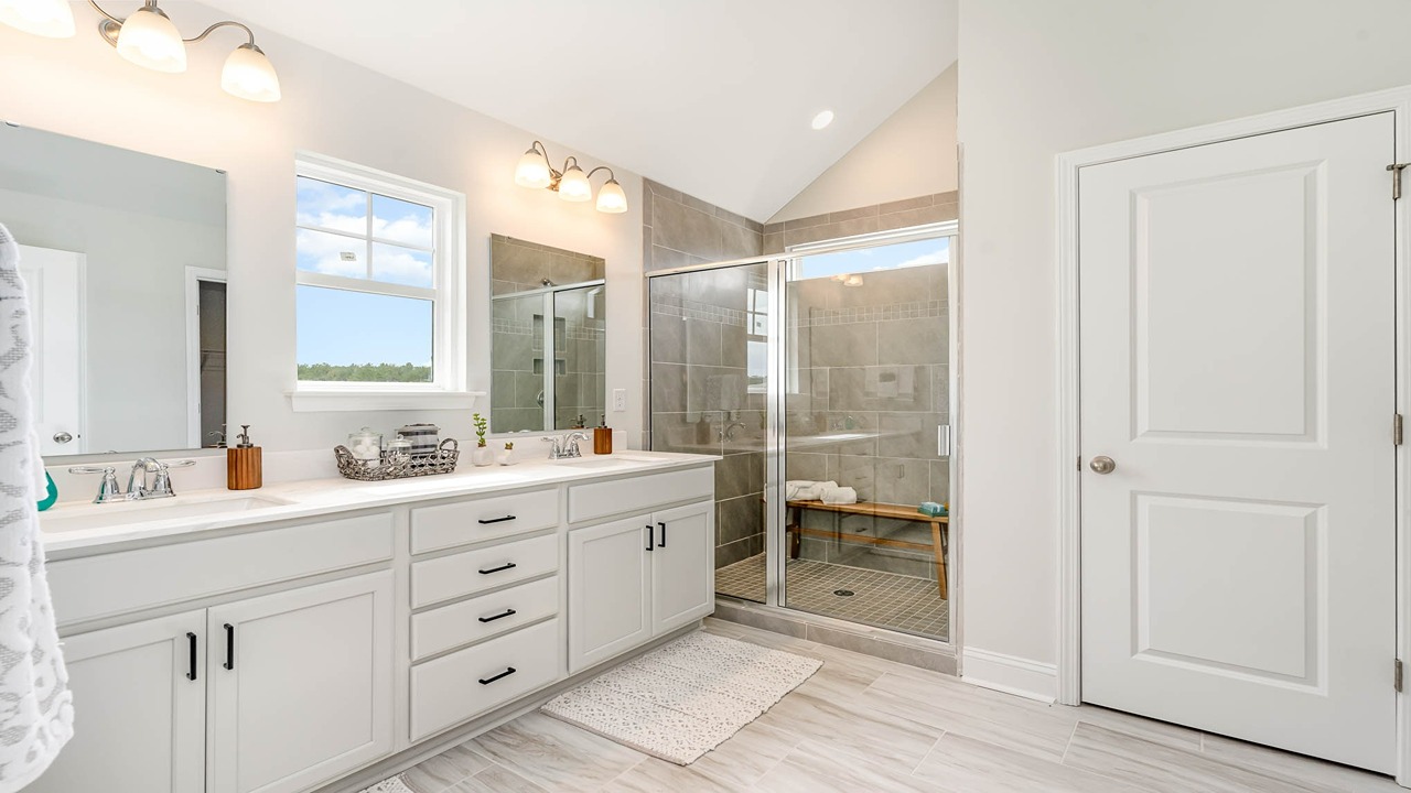 primary bedroom with gray cabinets