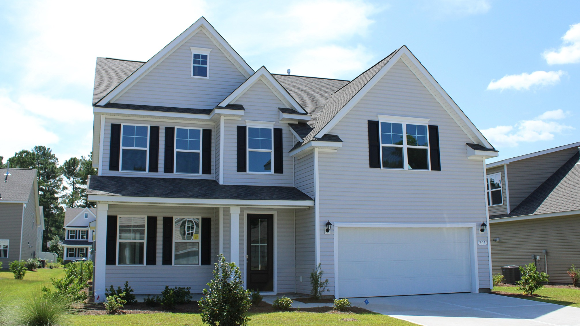 Forrester E Exterior with vinyl siding