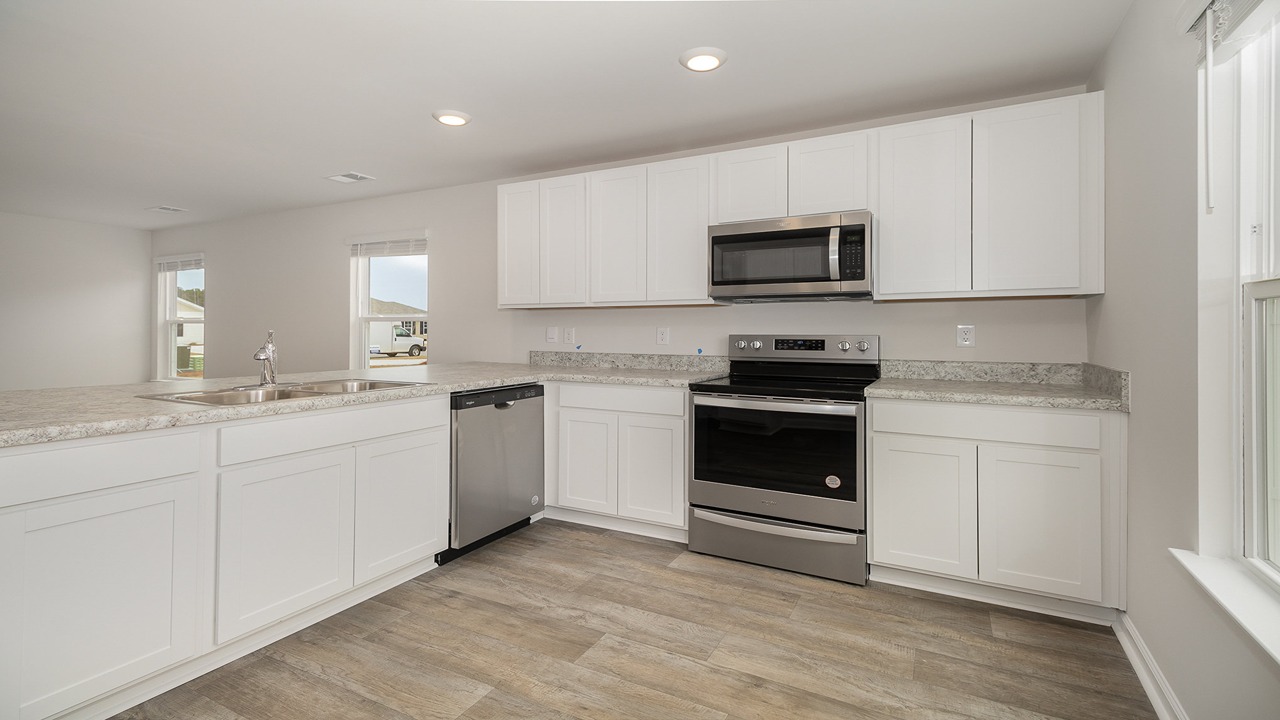 kitchen with white cabinets