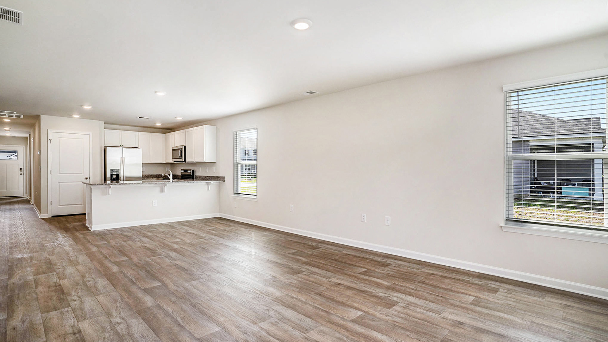 living room with ample lighting