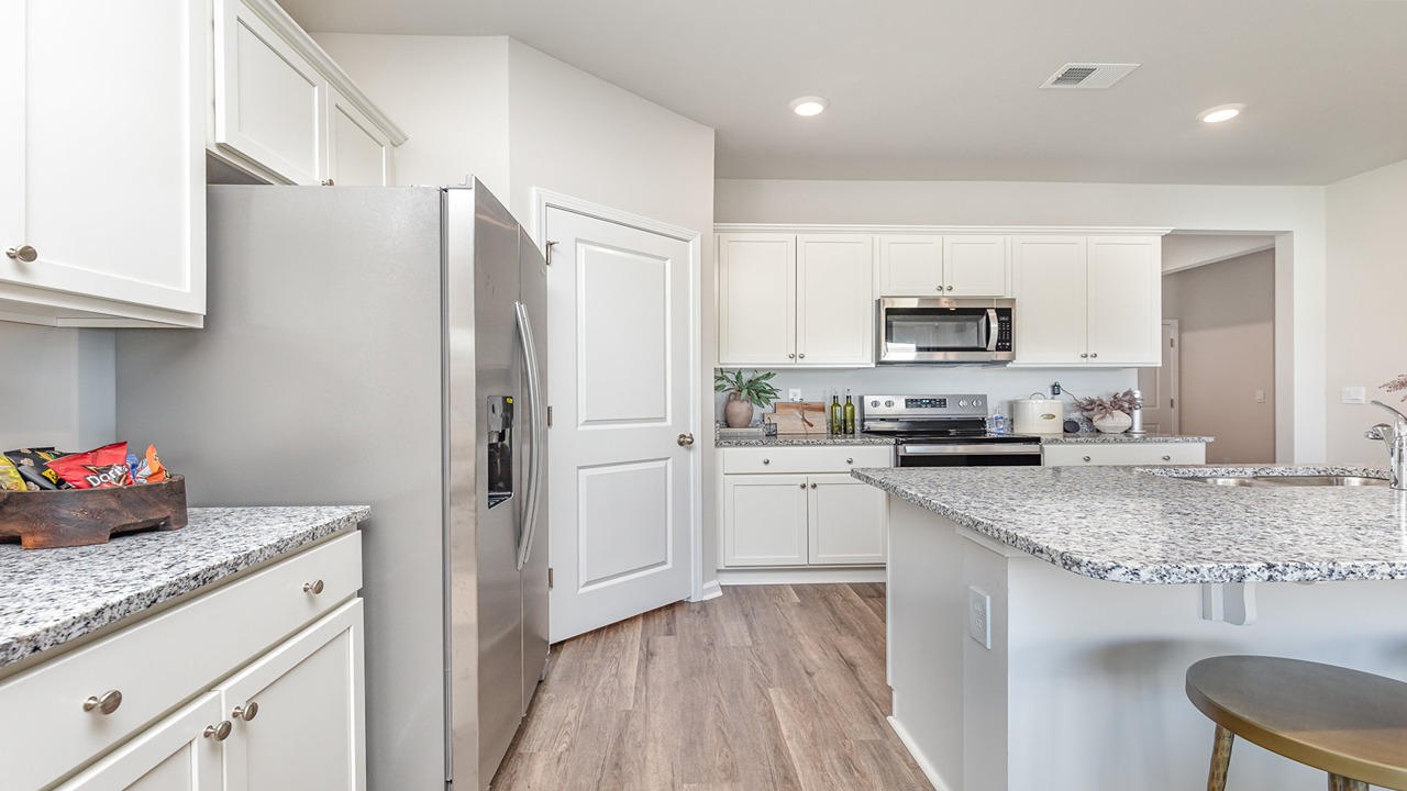 kitchen with white cabinets