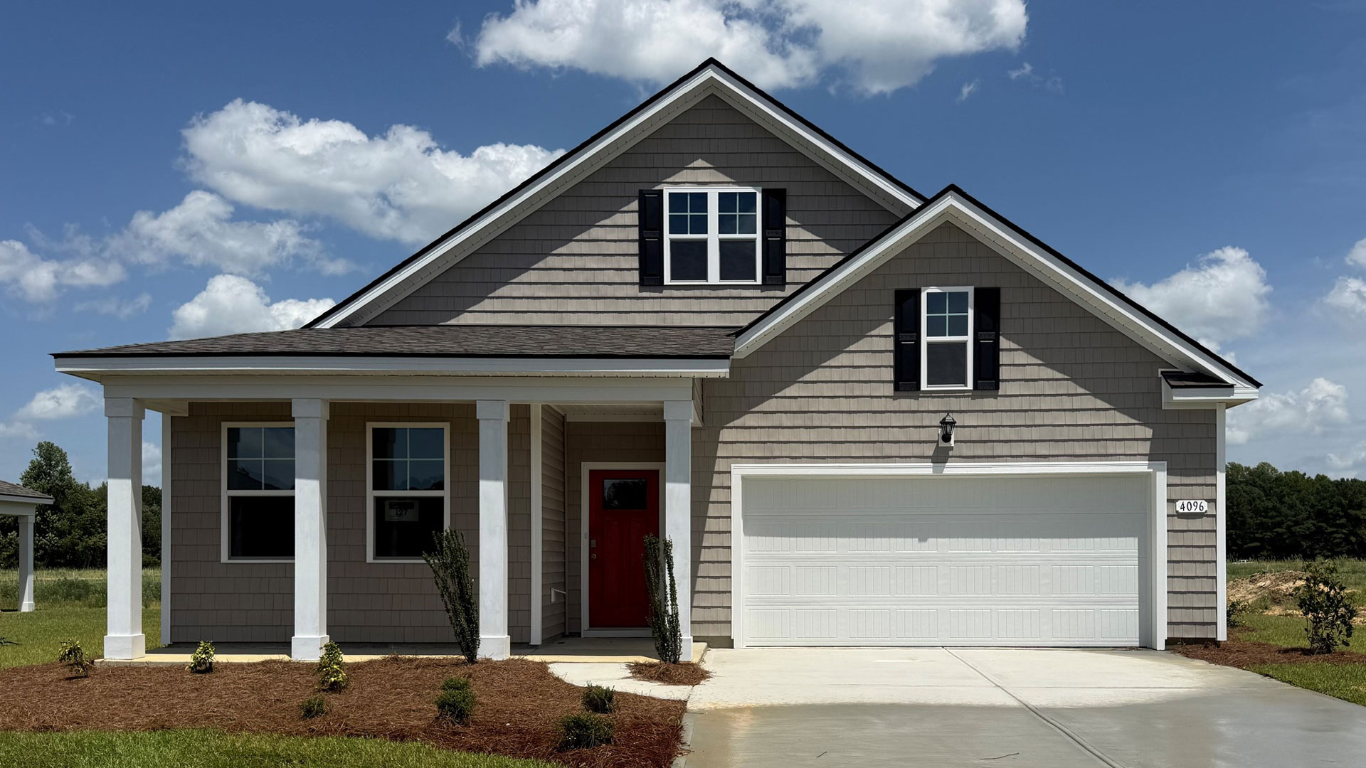 two story home with vinyl siding