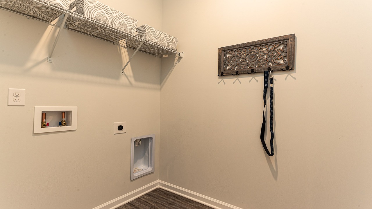 laundry room with wire shelving