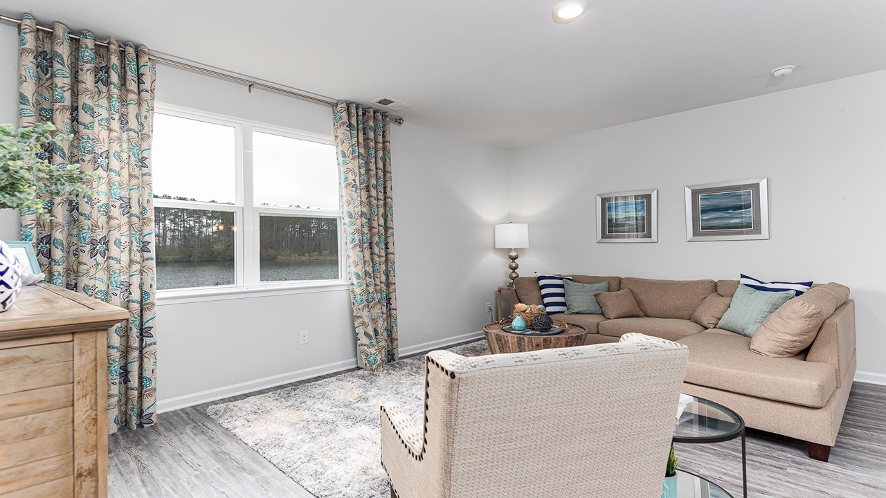 living room with ample lighting