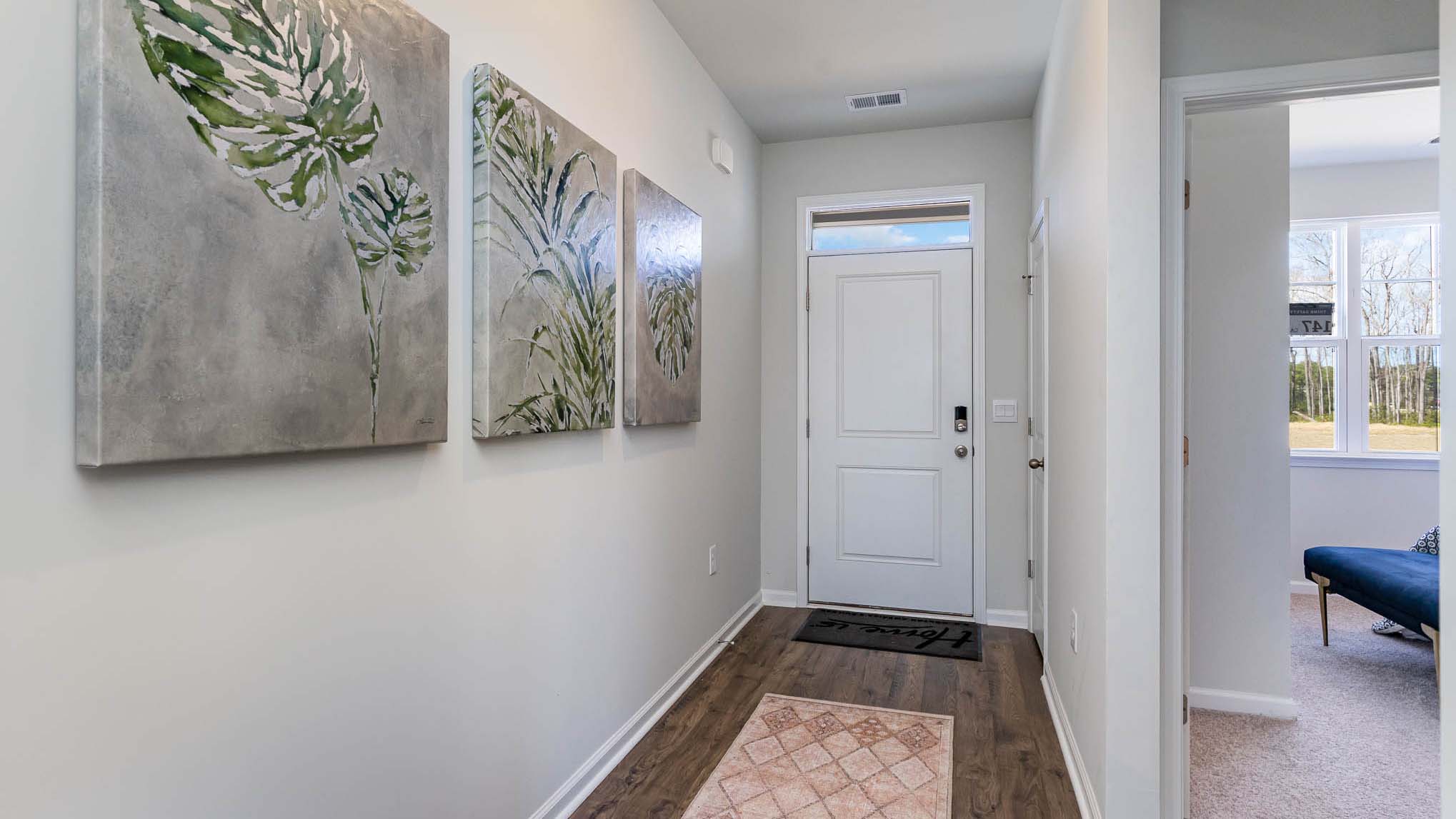 entryway with white door