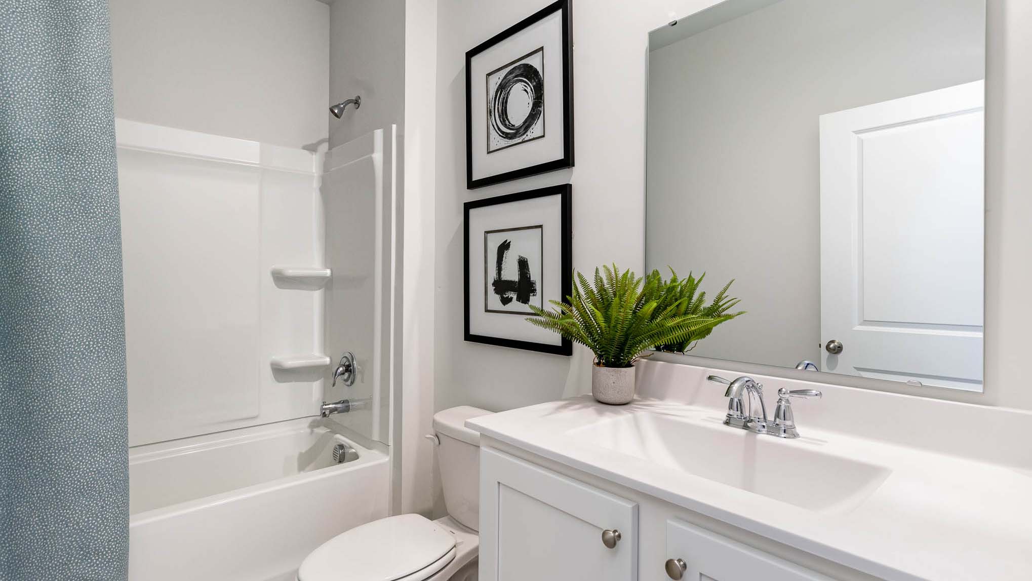 bathroom with quartz counters