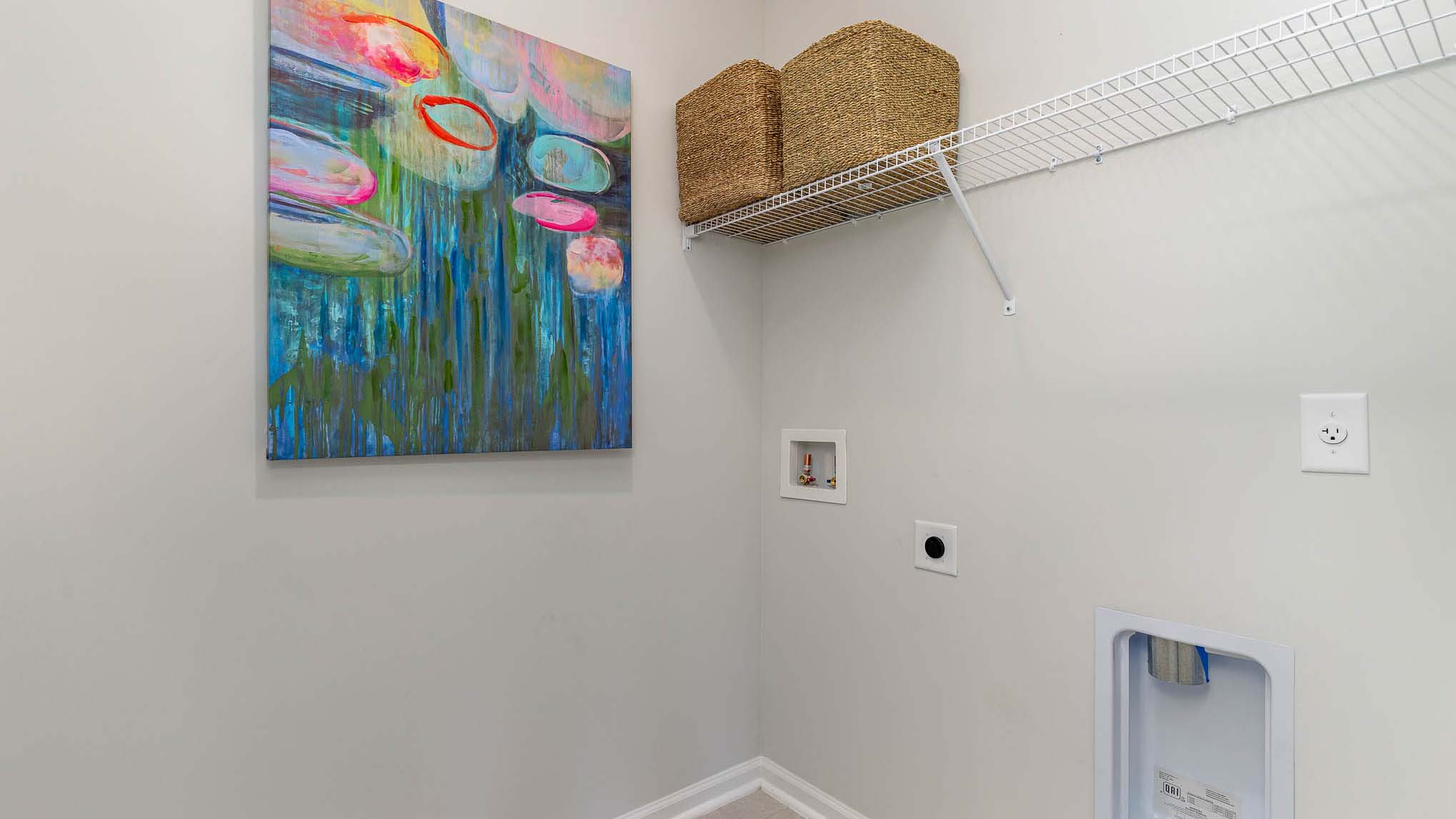 laundry room with wire shelving