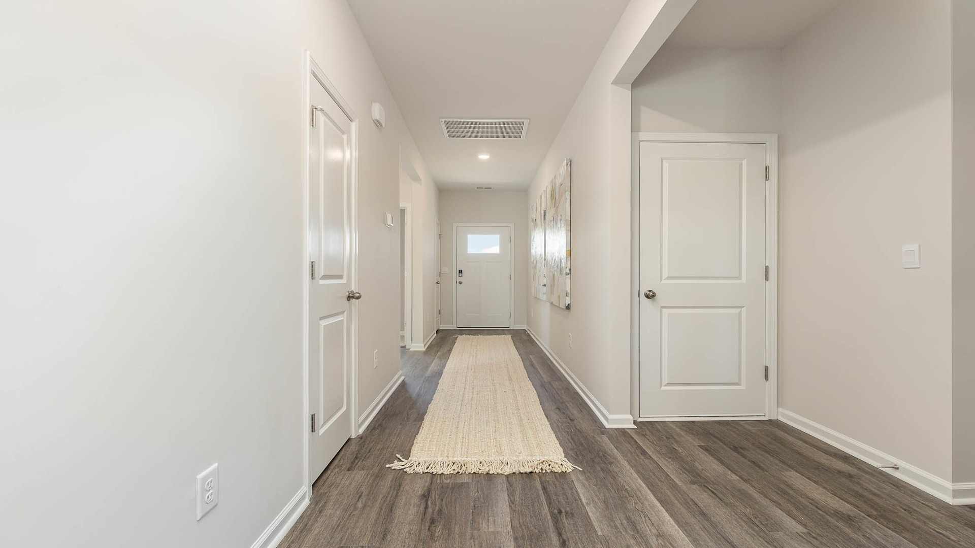 entryway with white door