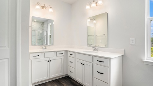 bathroom with quartz counters
