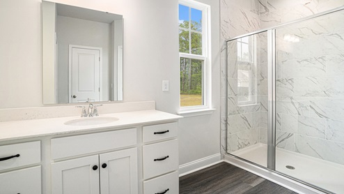 bathroom with quartz counters