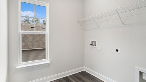 laundry room with wire shelving