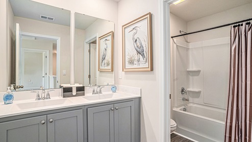 bathroom with quartz counters