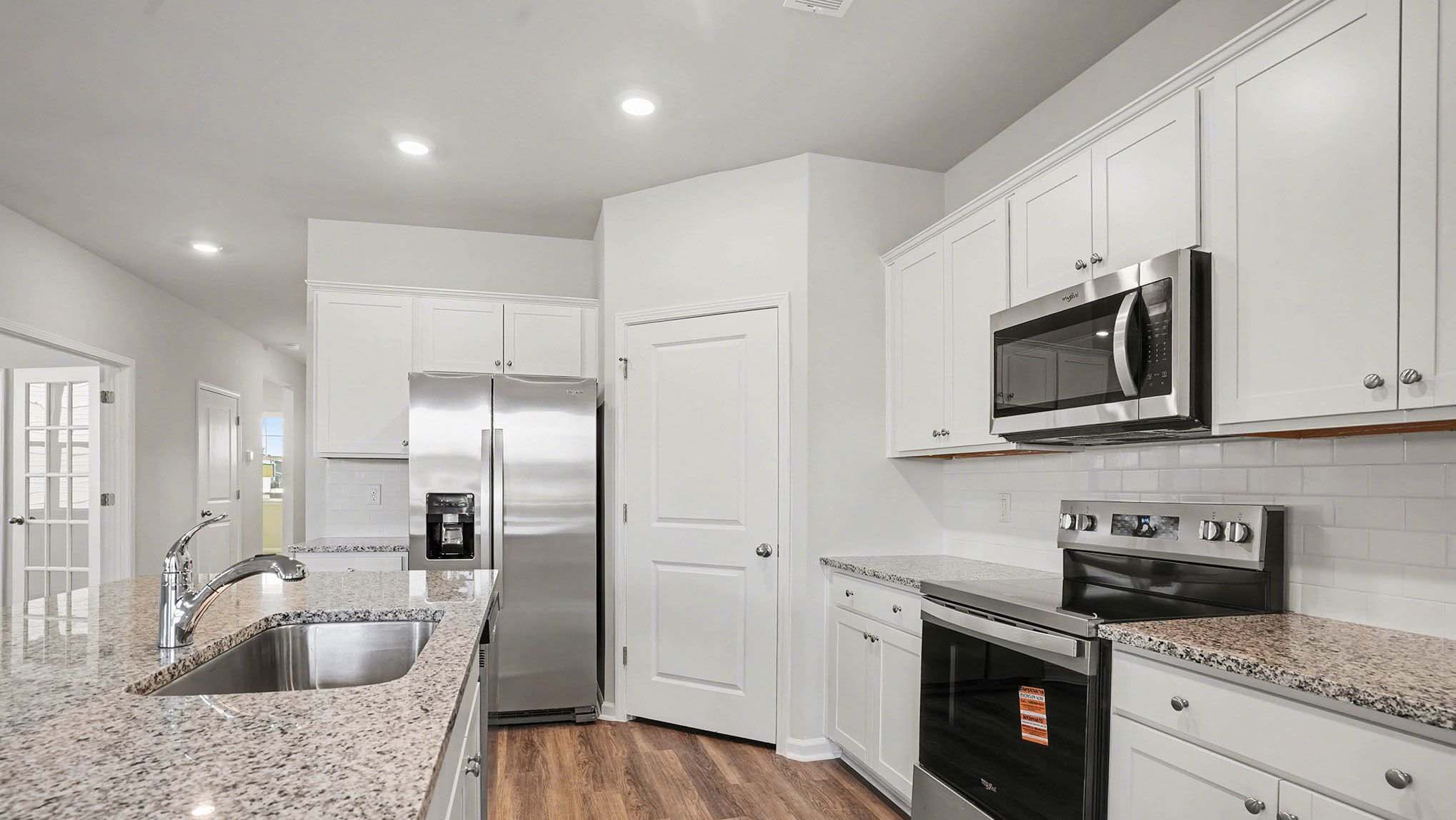 kitchen with white cabinets