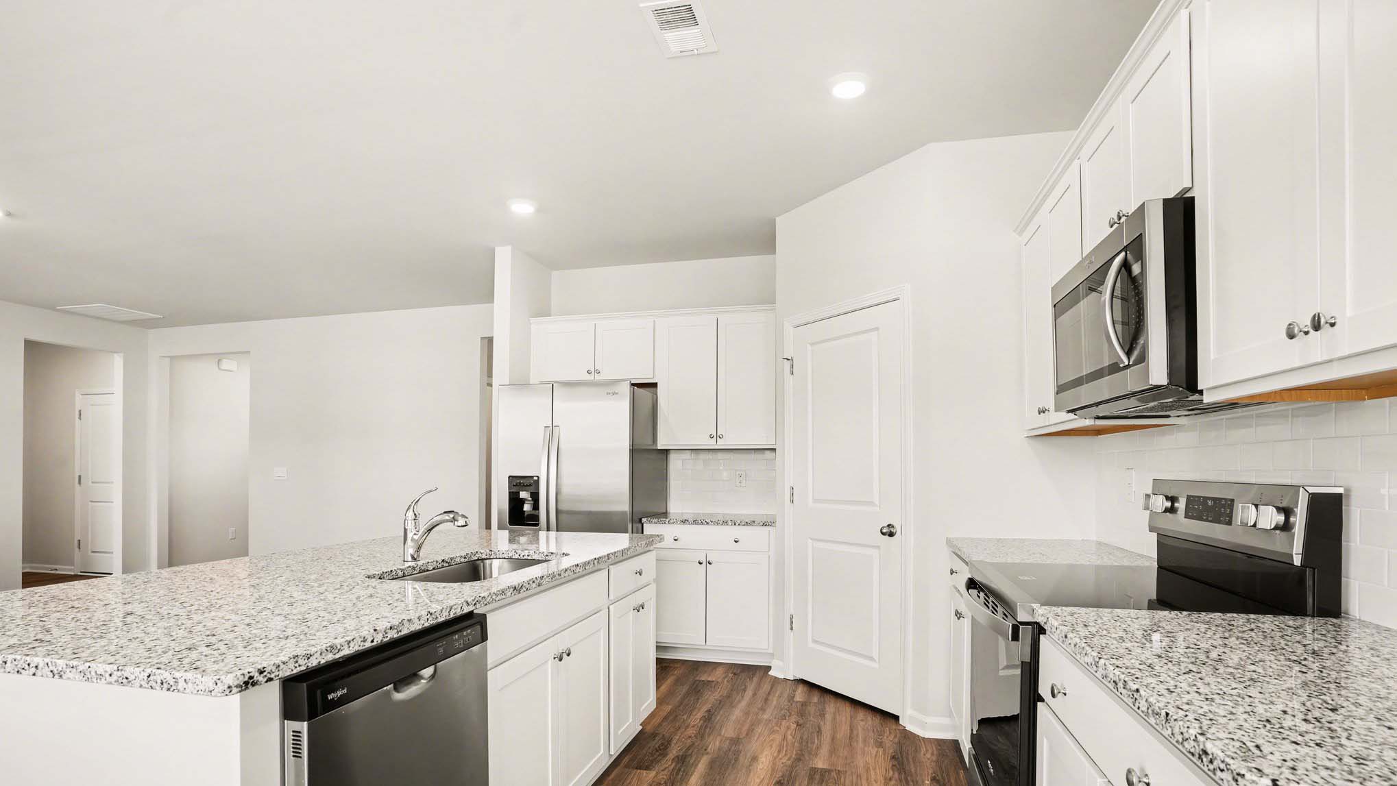 kitchen with white cabinets