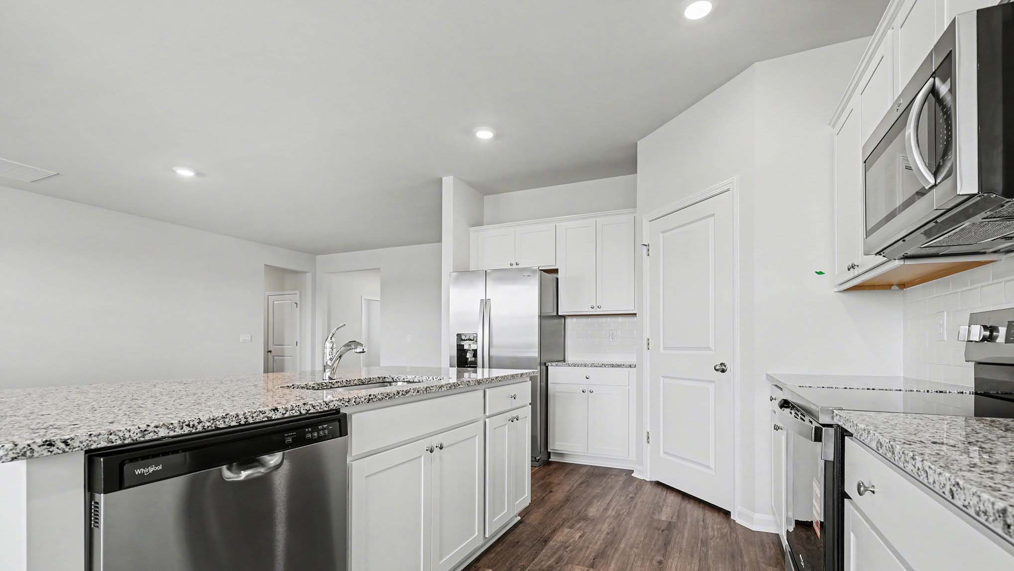 booth kitchen with stainless steel appliances