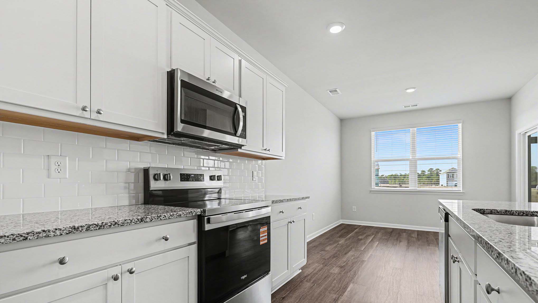 kitchen with white cabinets