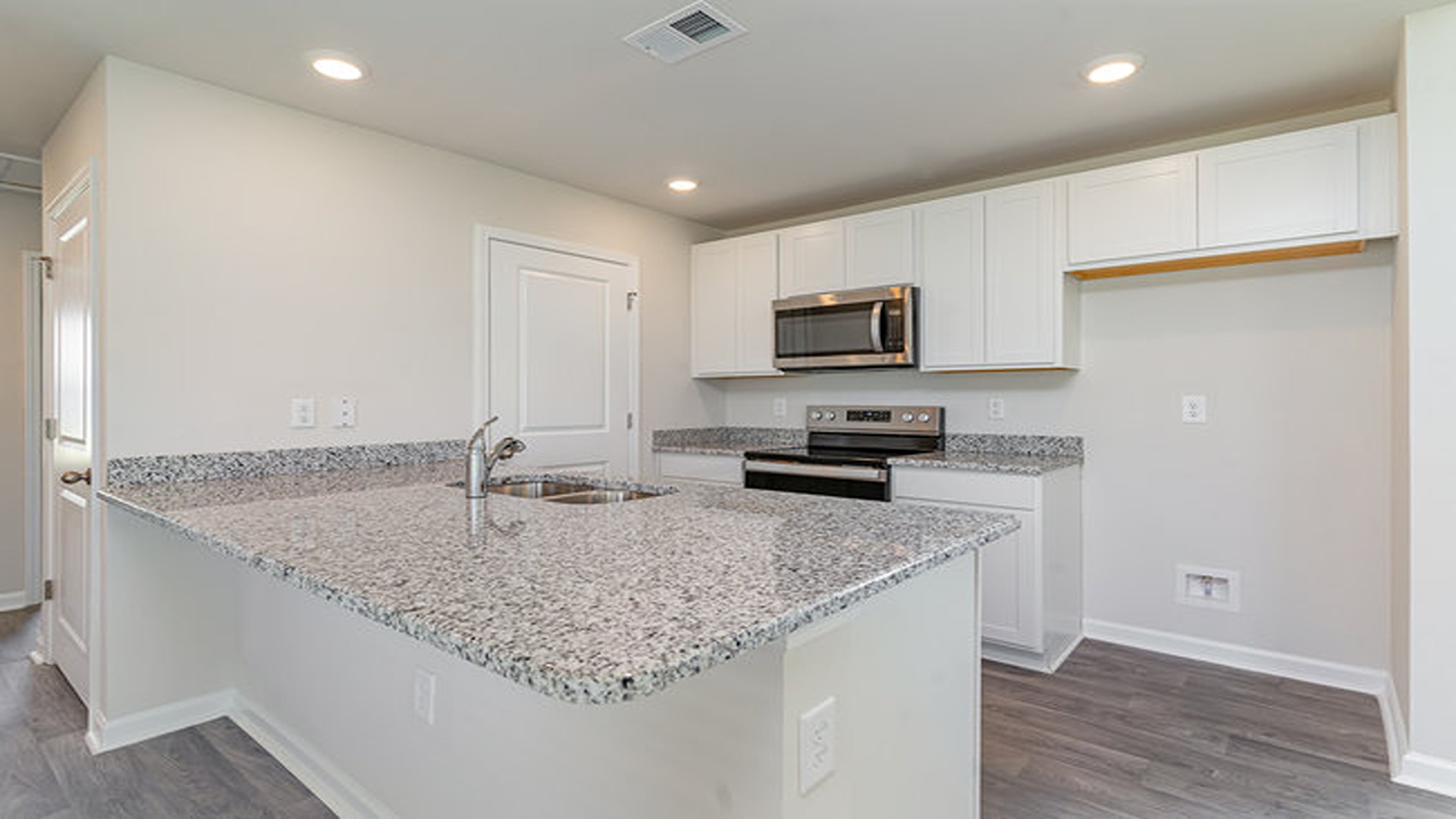 kitchen with white cabinets