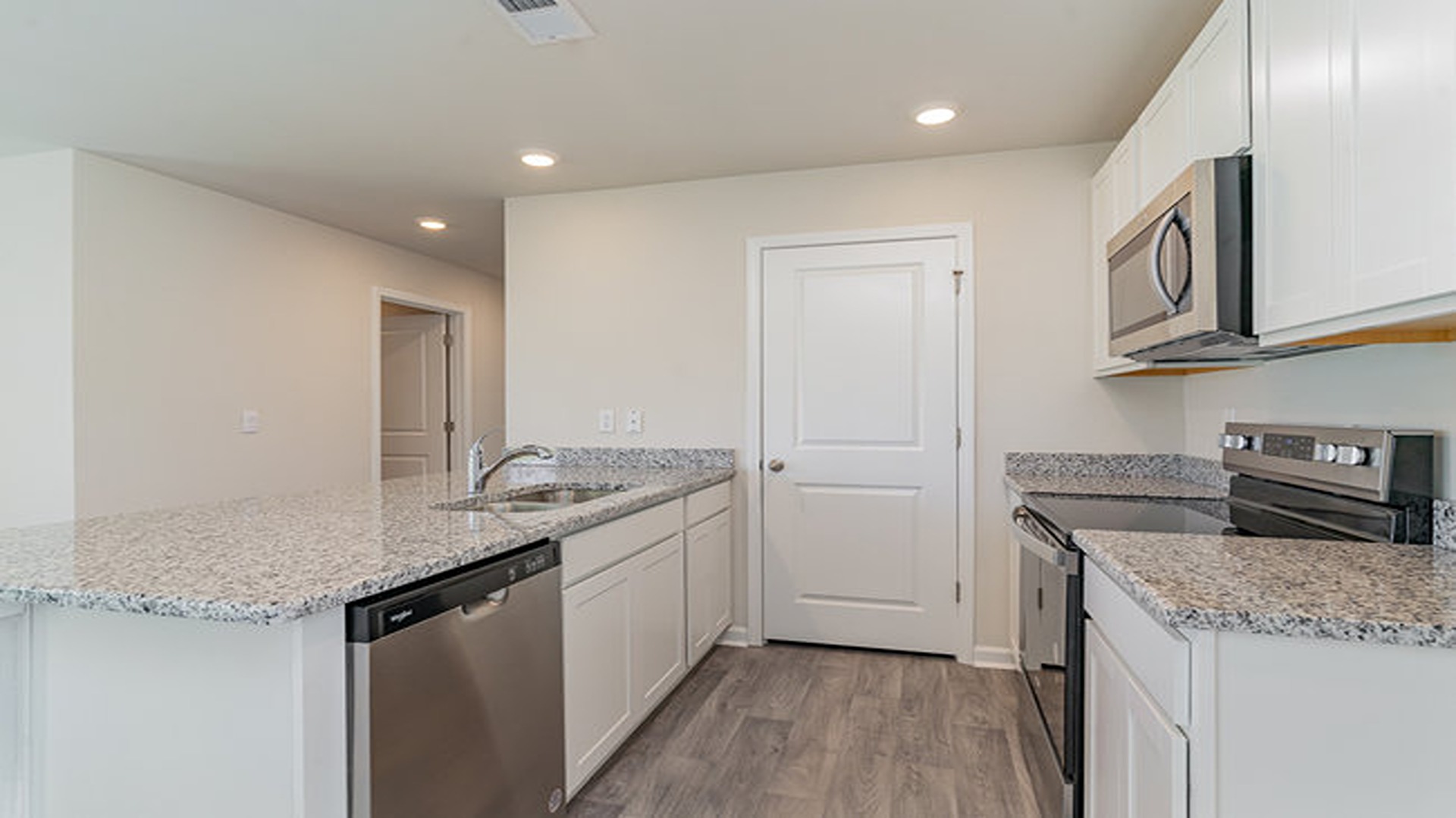 kitchen with white cabinets