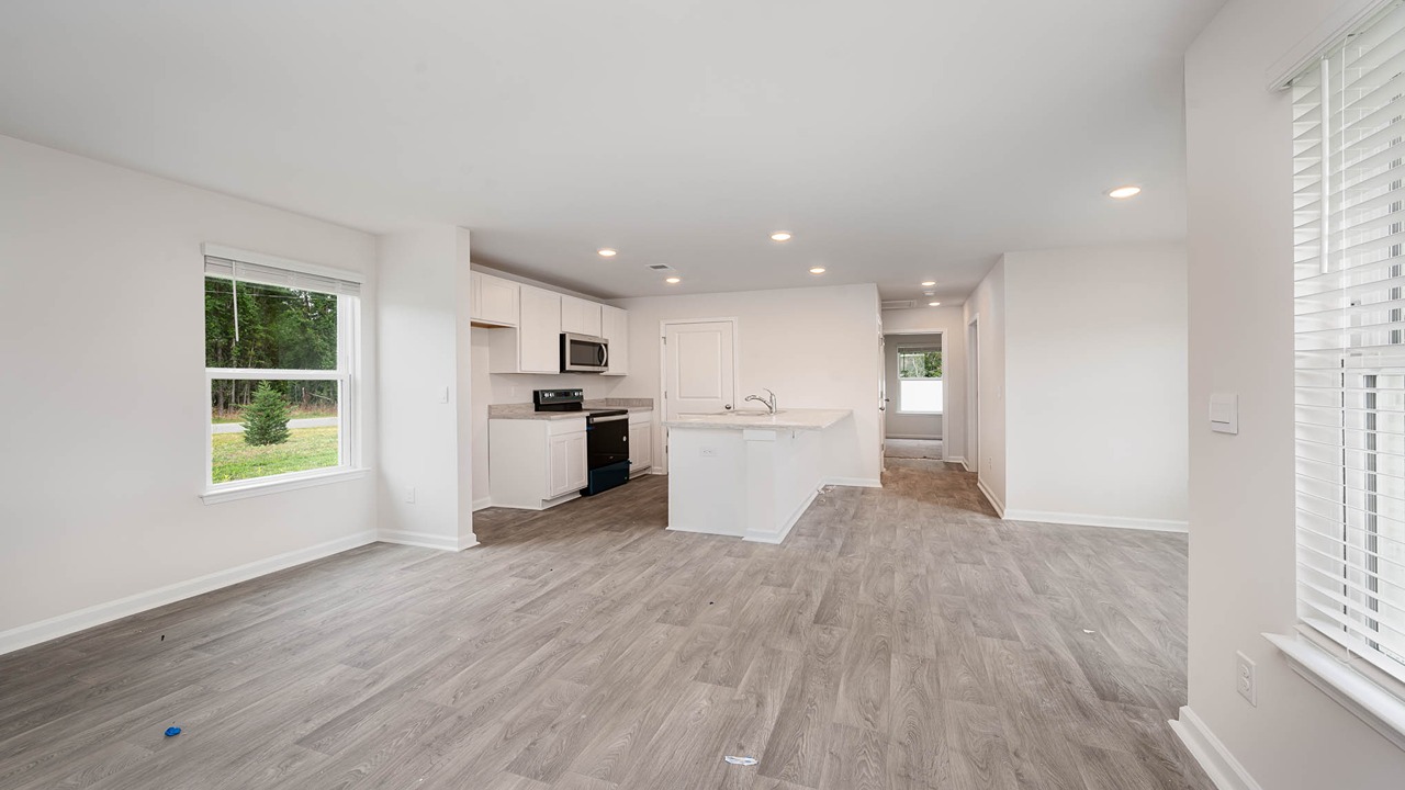 Wyeth living area with view of kitchen