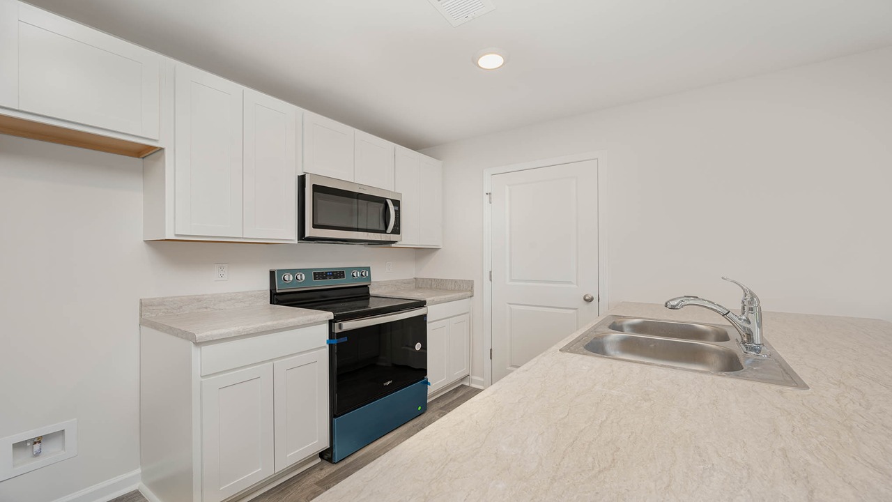 Wyeth kitchen with white cabinets