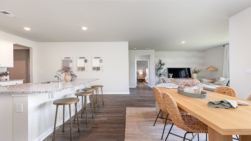 Cali kitchen, dining, and living room overview