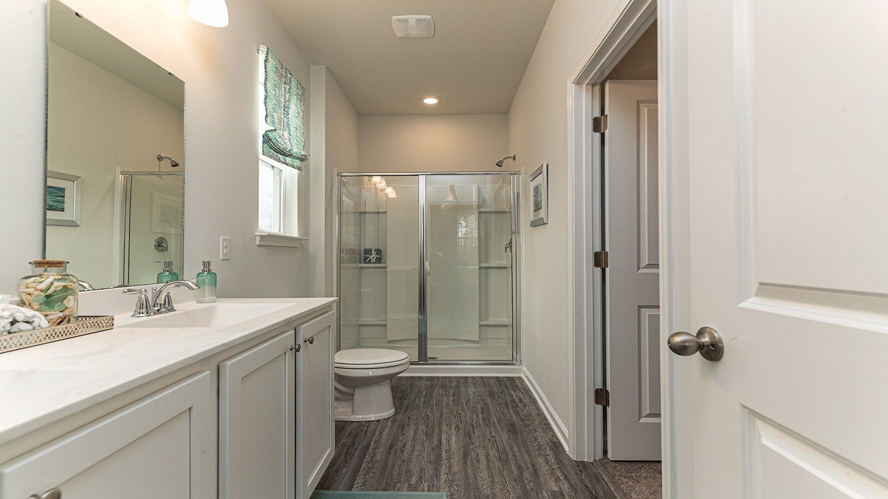 bathroom with quartz counters