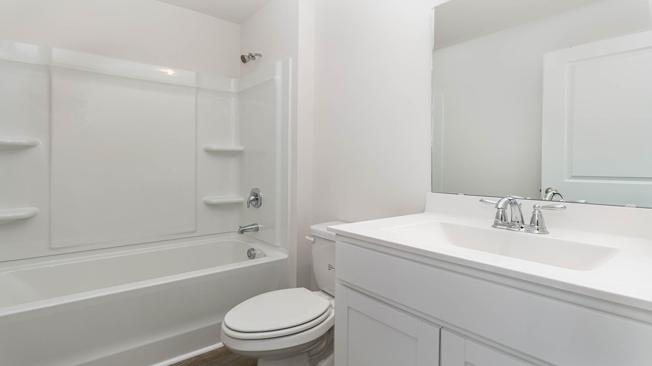 bathroom with quartz counters