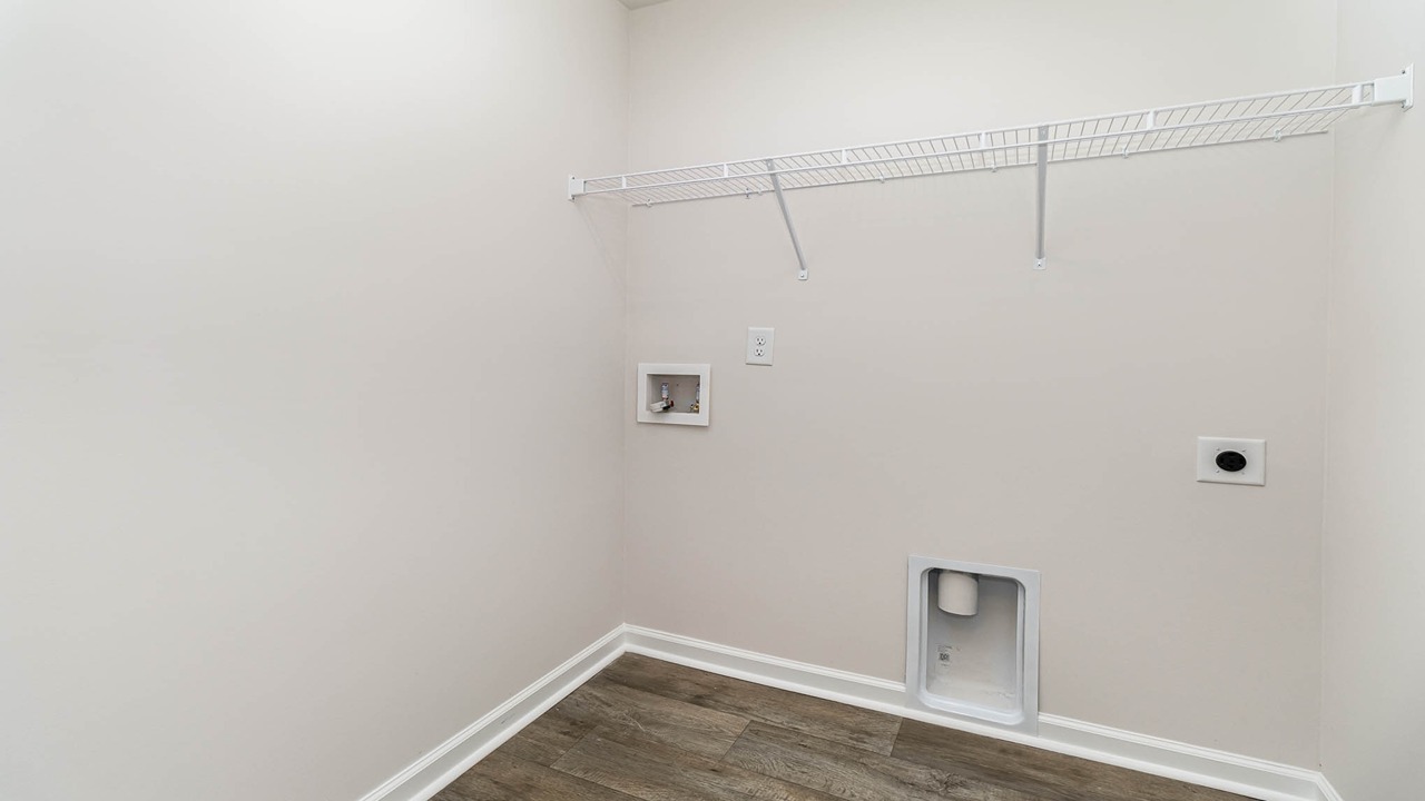 laundry room with wire shelving