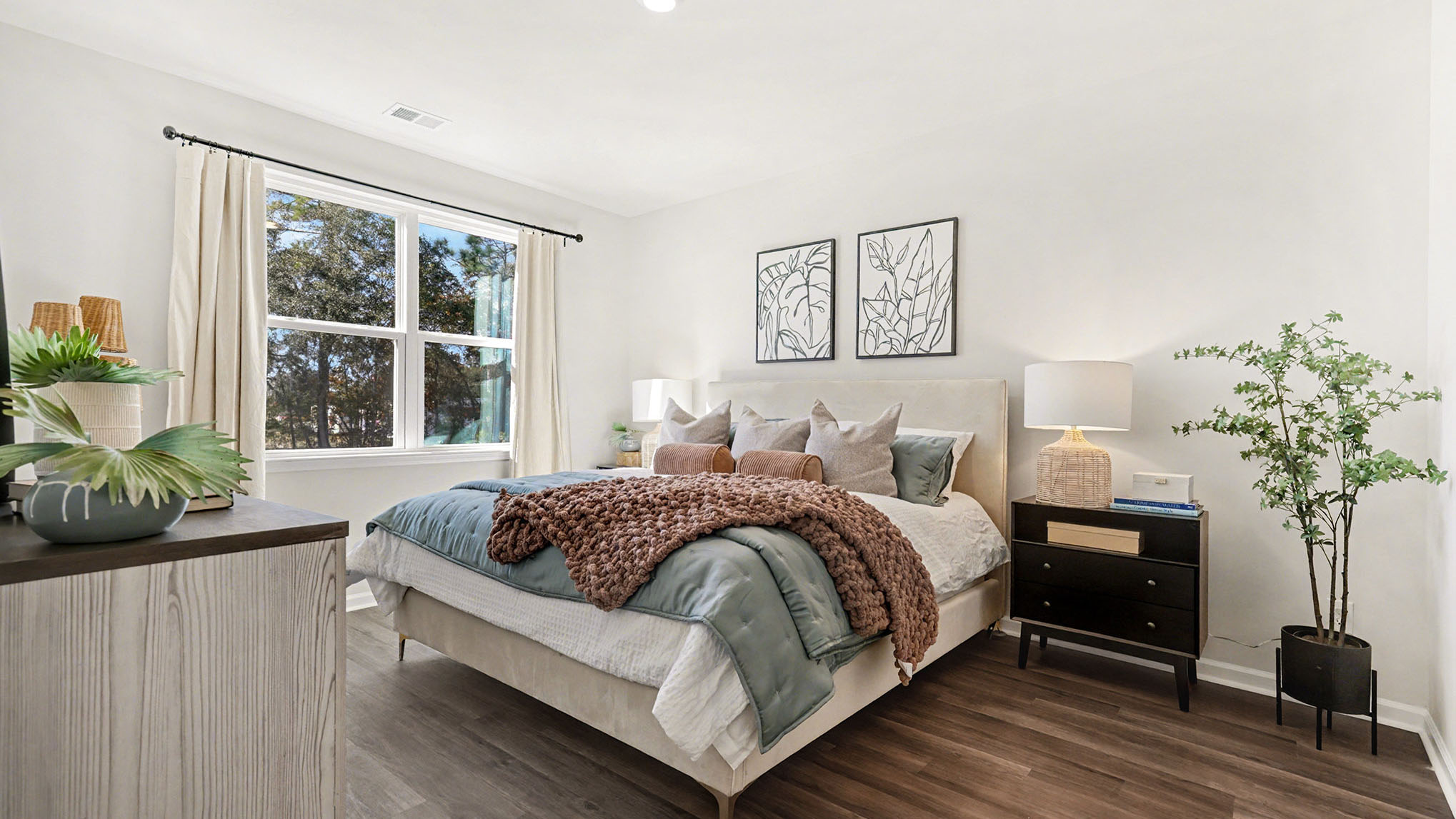 bedroom with ample lighting