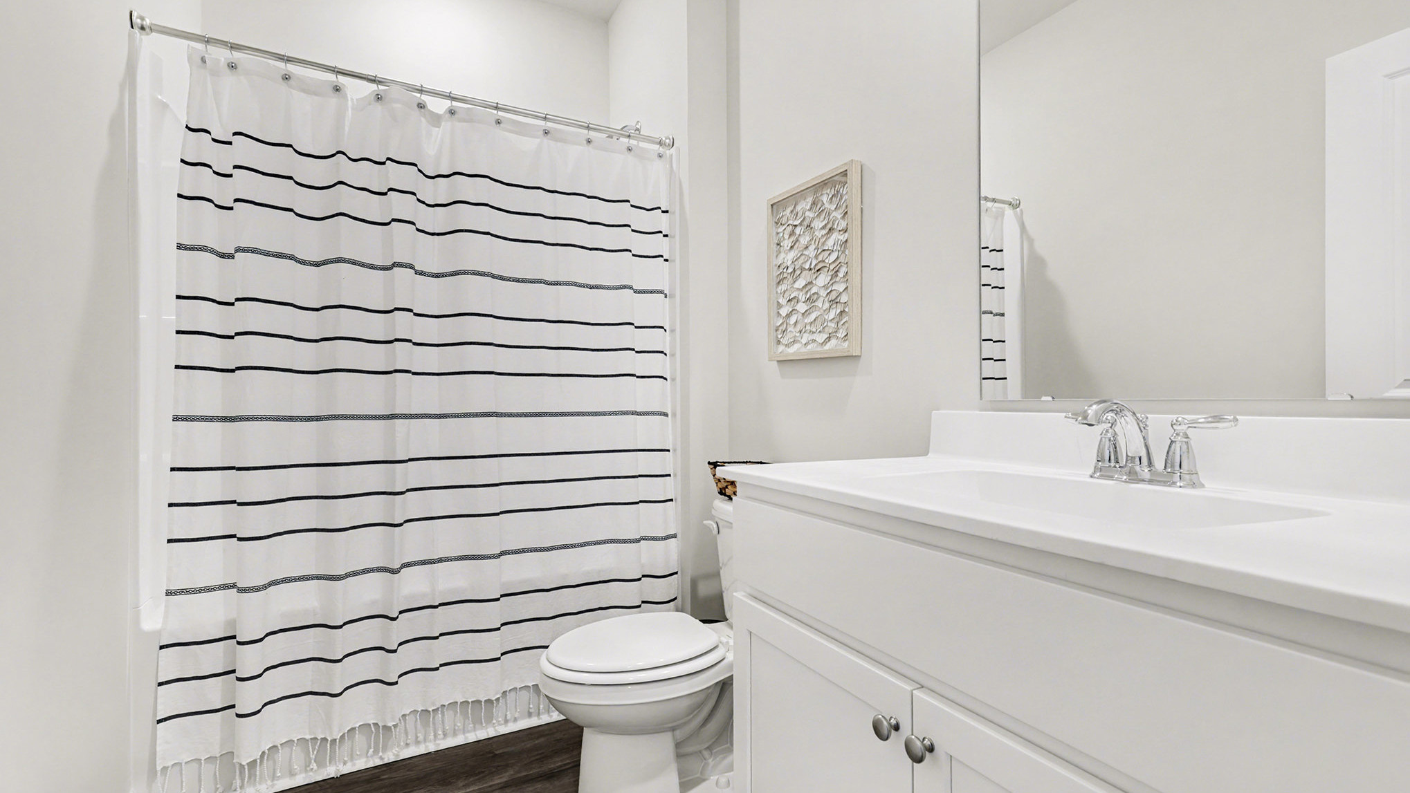 bathroom with quartz counters