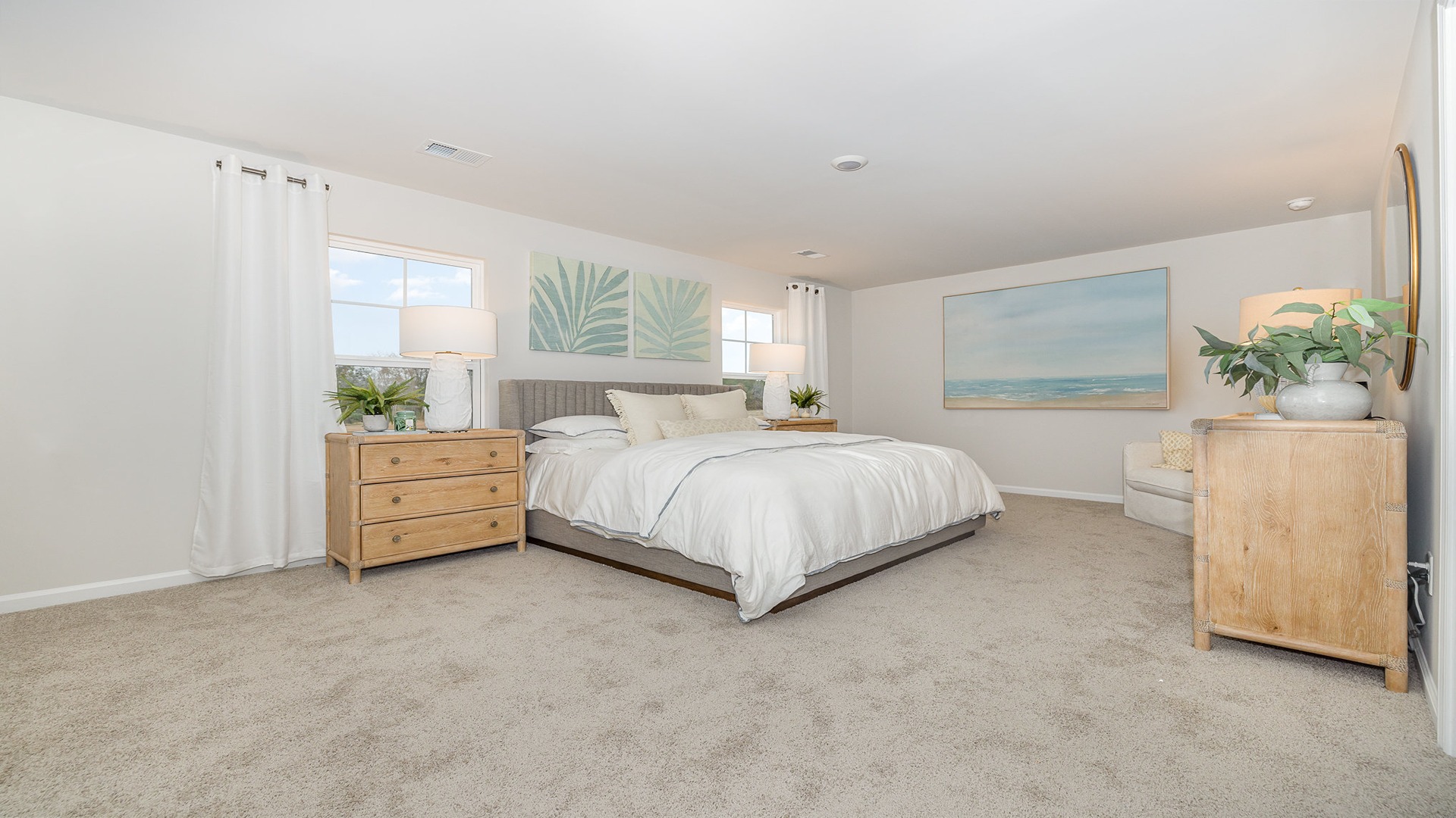 primary bedroom with carpet