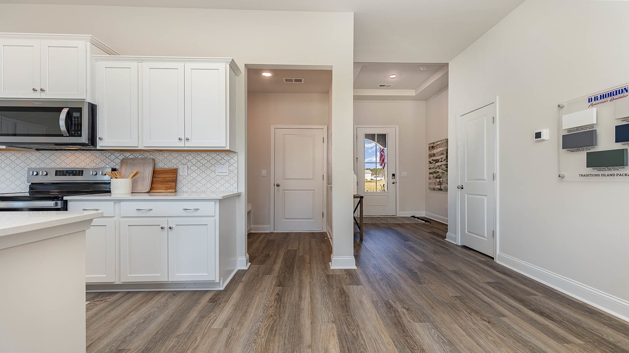 kitchen with white cabinets and granite countertops