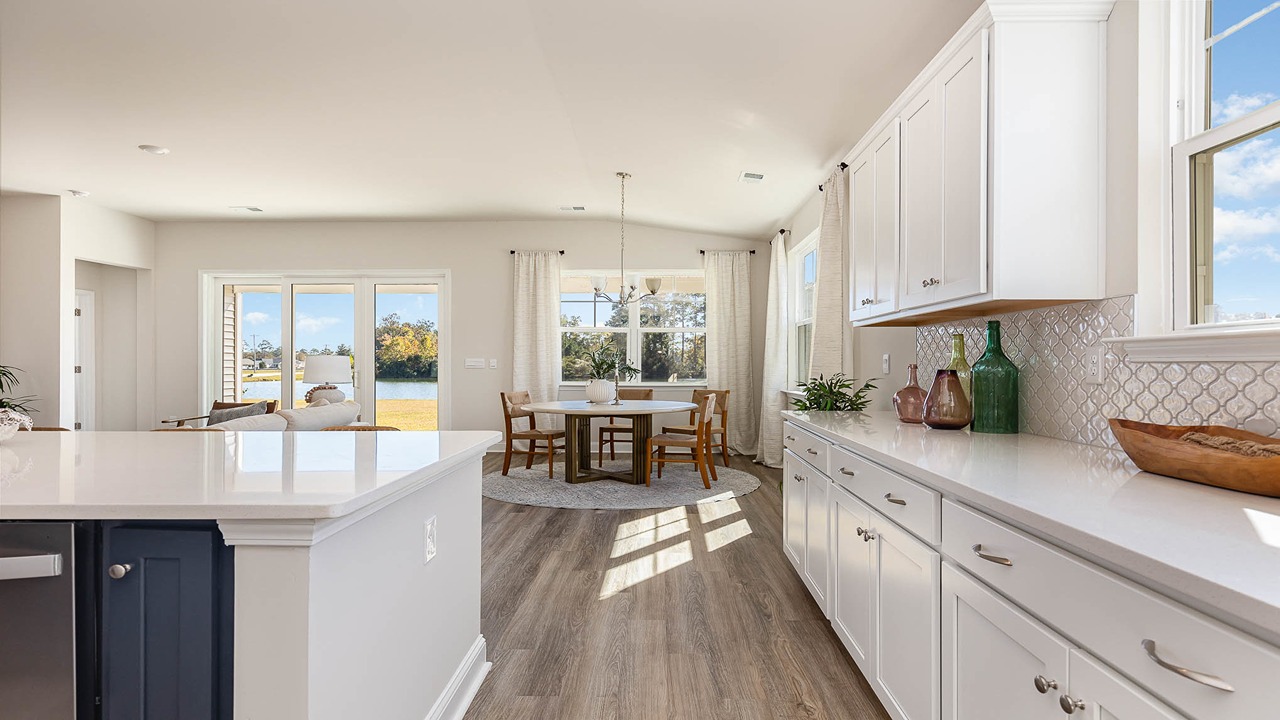 kitchen with white cabinets and granite countertops