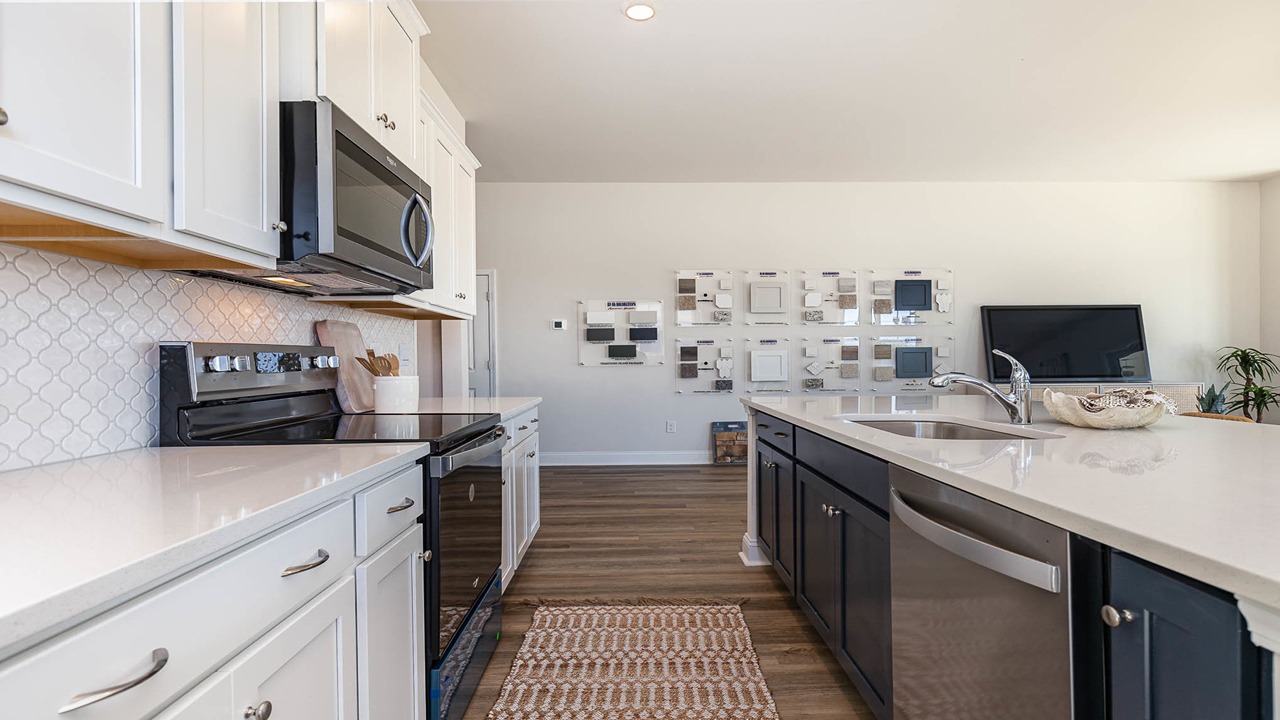 kitchen with white cabinets and granite countertops