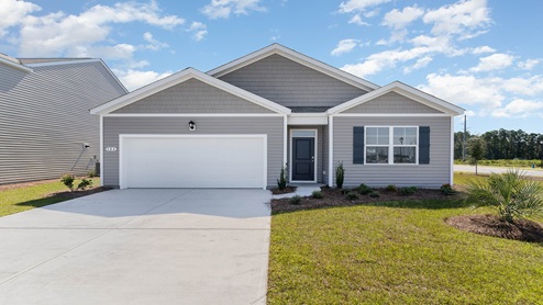 Single-story home with siding